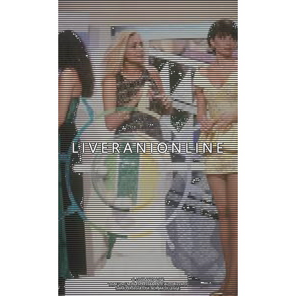DIAP-RETROSPETTIVA MARA VENIER ATTIRCE E PRESENTATRICE TELEVISIVA NELLA FOTO MARA VENIER NELLA TRASMISSIONE TELEVISIVA “UNA ROTONDA SUL MARE“NELL\'ANNO 1990 AG ALDO LIVERANI SAS 