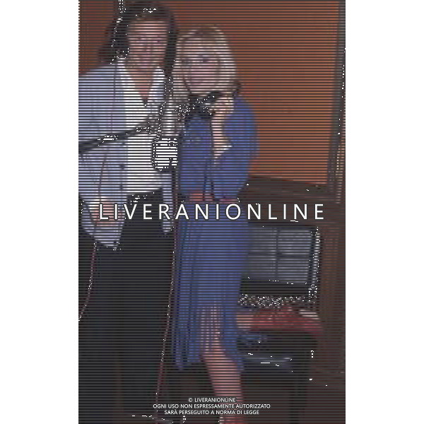 DIAP-RETROSPETTIVA MARIA GIOVANNA ELMI PRESENTATRICE TELEVISIVA NELLA FOTO MARIA GIOVANNA ELMI A ROMA NELL\'ANNO 1982 CON OSVALDO BEVILACQUA FOTO EDGARDO DELLA SCORCIOSA-AG ALDO LIVERANI SAS 