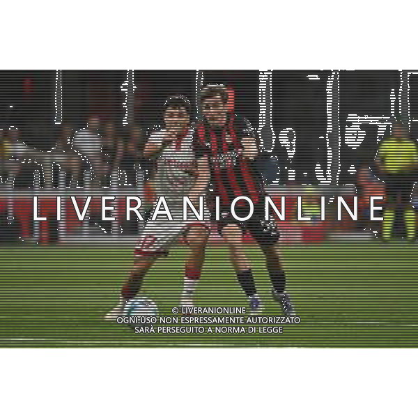 Milan vs Bari nella foto Emanuele Rao (Bari) e Alexis Saelemaekers (Milan) Milano 17-08-2025 Stadio Giuseppe Meazza - San Siro Milan vs Bari Coppa Italia Frecciarossa - trentaduesimi di finale foto Roberto Garavaglia/Agenzia Aldo Liverani sas
