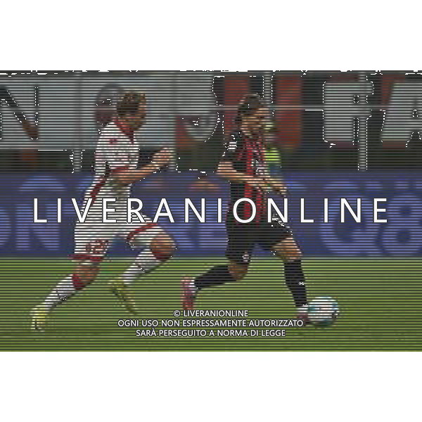 Milan vs Bari nella foto Luka Modric (Milan) e sulla SX Matthias Verreth (Bari) Milano 17-08-2025 Stadio Giuseppe Meazza - San Siro Milan vs Bari Coppa Italia Frecciarossa - trentaduesimi di finale foto Roberto Garavaglia/Agenzia Aldo Liverani sas