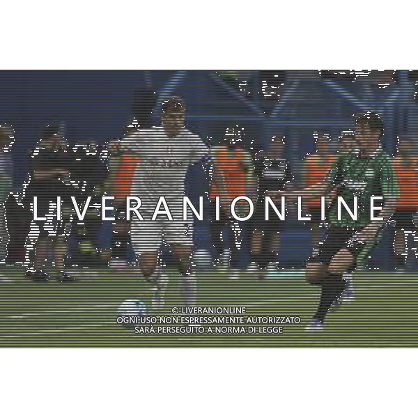 Giovanni Di Lorenzo of SSC Napoli competes for the ball with Andrea Pinamonti of US Sassuolo during US Sassuolo vs SSC Napoli, 1° Serie A Enilive 2025-26 game at Mapei stadium . Città del tricolore in Reggio Emilia (RE), Italy, on August 23, 2025. (Photo by Davide Casentini)- AGENZIA ALDO LIVERANI SAS