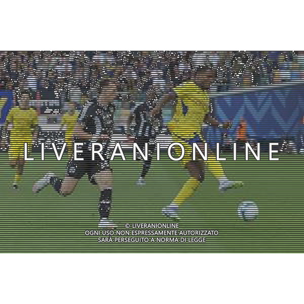 Amin Sarr of Hellas Verona FC battle for the ball with Nicolò Bertola of Udinese FC during Udinese Calcio FC vs Hellas Verona FC, 1° Serie A Enilive 2025-26 game at Bluenergy stadium in Udine (UD), Italy, on August 25, 2025. (Photo by Davide Casentini) AG ALDO LIVERANI SAS ALDO LIVERANI SAS
