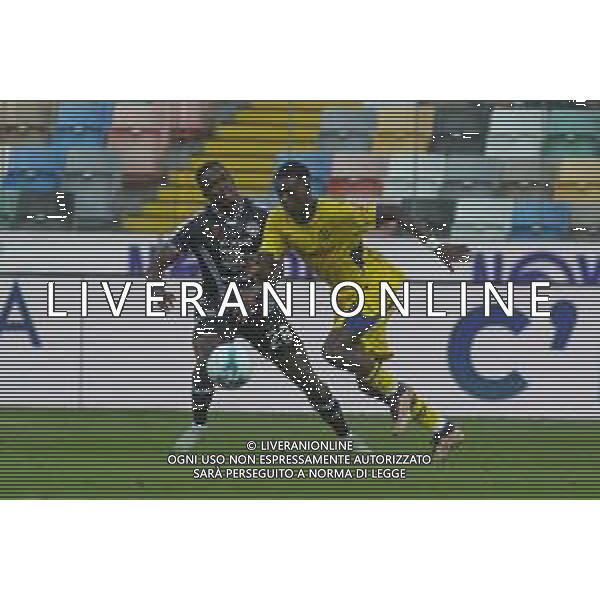 Fallou Cham "Fallou" of Hellas Verona FC battle for the ball with Oumar Mickael Solet Bomawoko "Solet" of Udinese FC during Udinese Calcio FC vs Hellas Verona FC, 1° Serie A Enilive 2025-26 game at Bluenergy stadium in Udine (UD), Italy, on August 25, 2025. (Photo by Davide Casentini) AG ALDO LIVERANI SAS