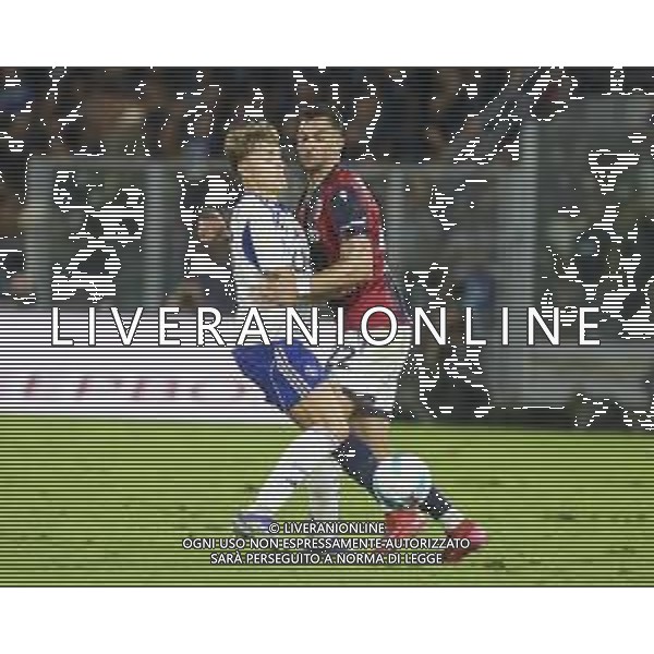 Charalampos Lykogiannis of Bologna FC battle for the ball withJesus Rodriguez Caraballo "Jesus R." of Como 1907 during Bologna FC vs Como FC, 2° Serie A Enilive 2025-26 game at Renato Dall\'Ara stadium in Bologna (BO), Italy, on August 30, 2025. (Photo by Davide Casentini)- AGENZIA ALDO LIVERANI SAS