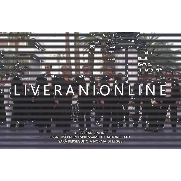 DIAP-RETROSPETTIVA MARCELLO MASTROIANNI ATTORE NELLA FOTO MARCELLO MASTROIANNI CON MASSIMO TROISI MARINA VLADY E ETTORE SCOLA A CANNES NELL\'ANNO 1989 AG ALDO LIVERANI SAS
