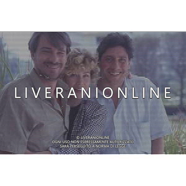 DIAP-RETROSPETTIVA RICKY TOGNAZZI ATTORE NELLA FOTO RICKY TOGNAZZI NANCY BRILLI E SERGIO CASTELLITTO NELL\'ANNO 1989 A CANNES AG ALDO LIVERANI SAS 
