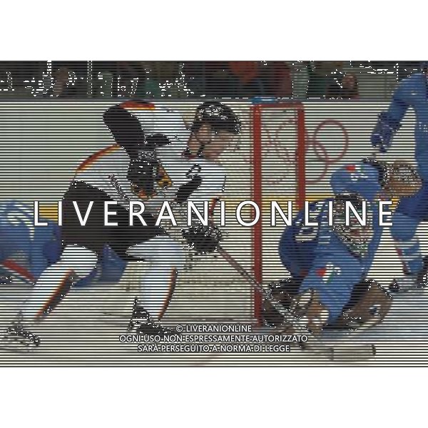 TORINO 18/02/2006 XX OLIMPIADI INVERNALI HOCKEY SU GHIACCIO ITALIA.-GERMANIA NELLA FOTO MUZZATTI JASON PH GIGI ARCAINI/AG.ALDO LIVERANI