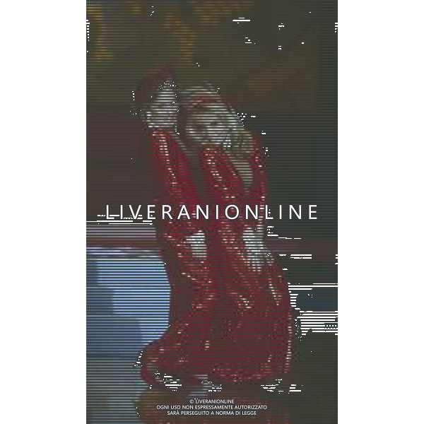 DIAP-RETROSPETTIVA MARIA GIOVANNA ELMI PRESENTATRICE TELEVISIVA NELLA FOTO MARIA GIOVANNA ELMI A MILANO NELL\'ANNO 1990 NELLA TRASMISSIONE TELEVISIVA “SIMPATICISSIMA “ CON ROSANNA VAUDETTI AG ALDO LIVERANI SAS