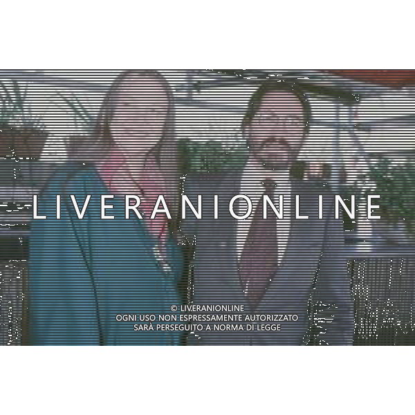 DIAP-RETROSPETTIVA RENZO ROSSELLINI REGISTA NELLAFOTO RENZO ROSSELLINI CONGERALDINEPAGE A TERRAZZA MARTINI NELLL\'ANNO 1986 AG ALDO LIVERANI SAS