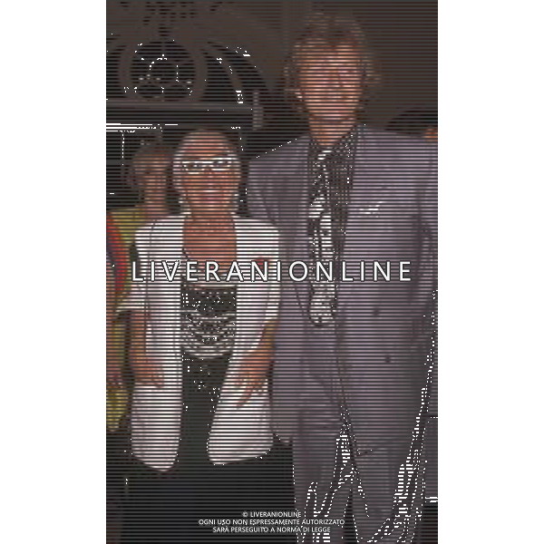 DIAP-RETROSPETTIVA RUTGER HAUER ATTORE NELLA FOTO RUTGER HAUER A VENEZIA NELL\'ANNO 1989 CON LINA WERTMULLER AG ALDO LIVERANI SAS