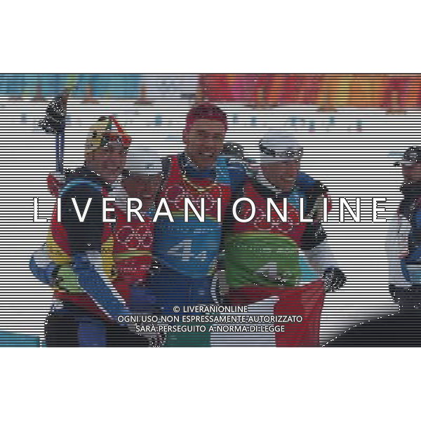 STAFFETTA MASCHILE SCI DI FONDO 19/02/2006 XX OLIMPIADI INVERNALI TORINO 2006 NELLA FOTO VINCITORI DELLA MEDAGLIA D\'ORO - PILLER COTTRER PIETRO-VALBUSA FULVIO-ZORZI CRISTIAN-DI CENTA GIORGIO PH ARCAINI/AGENZIA ALDO LIVERANI
