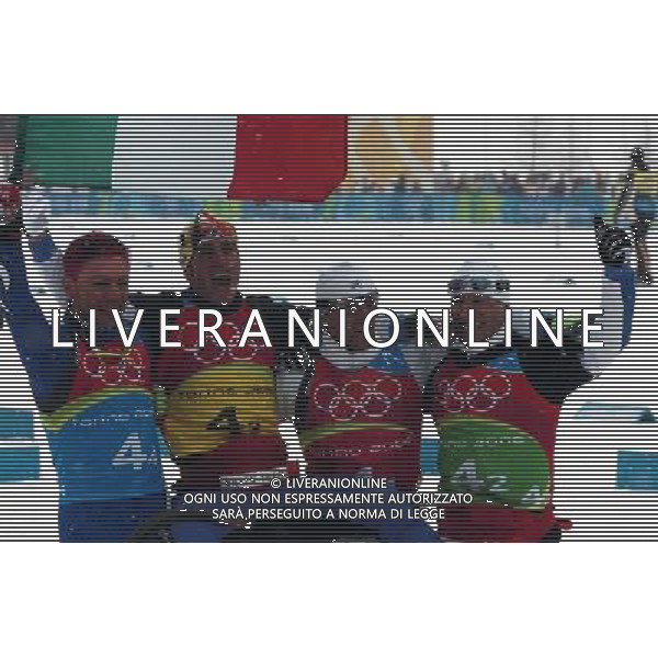STAFFETTA MASCHILE SCI DI FONDO 19/02/2006 XX OLIMPIADI INVERNALI TORINO 2006 NELLA FOTO VINCITORI DELLA MEDAGLIA D\'ORO - PILLER COTTRER PIETRO-VALBUSA FULVIO-ZORZI CRISTIAN-DI CENTA GIORGIO PH ARCAINI/AGENZIA ALDO LIVERANI
