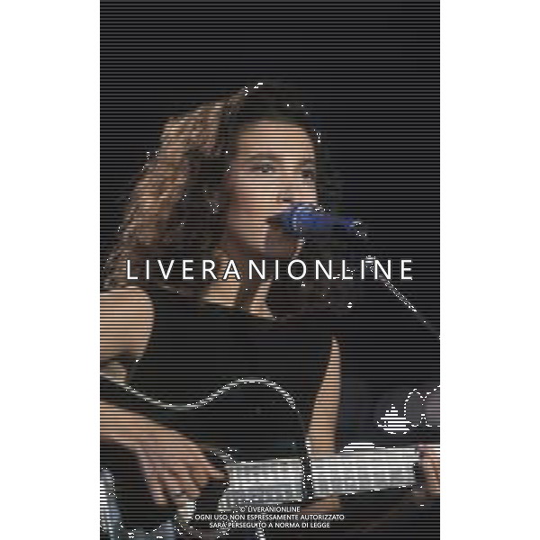 DIAP-RETROSPETTIVA GRAZIA DI MICHELE CANTANTE NELLA FOTO GRAZIA DI MICHELE AL FESTIVAL DI SANREMO NELL\'ANNO 1990 AG ALDO LIVERANI SAS