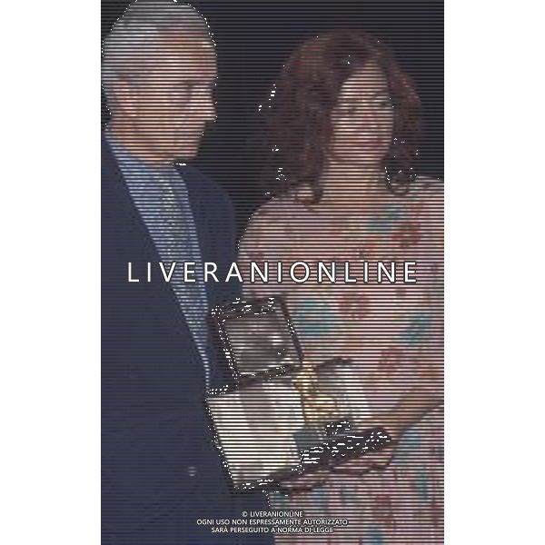 DIAP-RETROSPETTIVA MICHELANGELO ANTONIONI REGISTA NELLA FOTO MICHELANGELO ANTONIONI A TAORMINA NELL\'ANNO 1991 CON LA MOGLIE ENRICA FICO AG ALDO LIIVERANI SAS