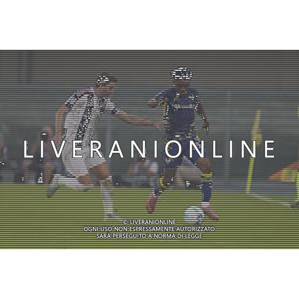 Gift Orban of Hellas Verona FC competes for the ball with Manuel Locatelli of Juventus FC during Hellas Verona FC vs Juventus FC, 4° Serie A Enilive 2025-26 game at Marcantonio Bentegodi stadium in Verona (VR), Italy, on September 20, 2025. (Photo by Davide Casentini)- AGENZIA ALDO LIVERANI