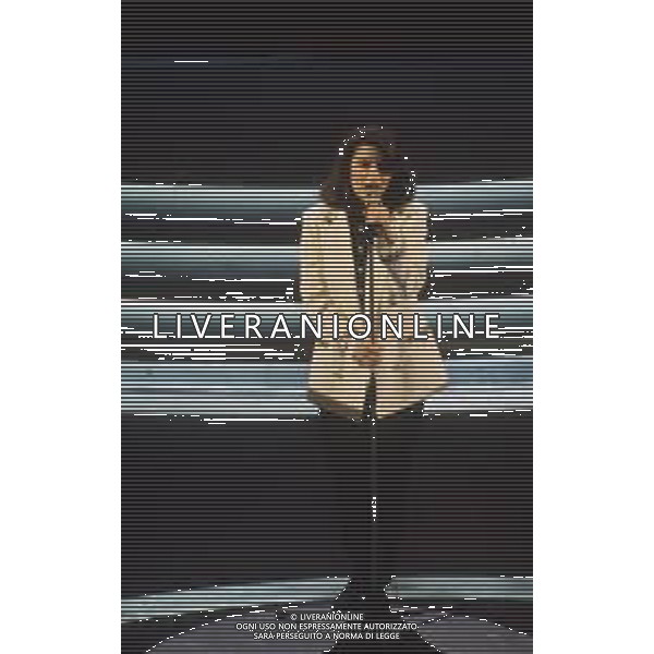 DIAP-RETROSPETTIVALAURA PAUSINI CANTANTE NELLA FOTO LAURA PAUSINI A SANREMO NELL\'ANNO 1993 AG ALDO LIVERANI SAS