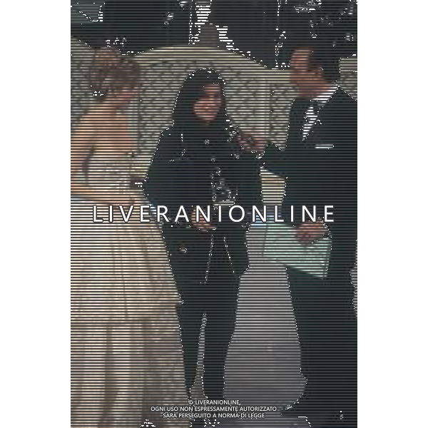 DIAP-RETROSPETTIVALAURA PAUSINI CANTANTE NELLA FOTO LAURA PAUSINI A SANREMO NELL\'ANNO 1993 CON PIPPO BAUDO E MILLY CARLUCCI AG ALDO LIVERANI SAS