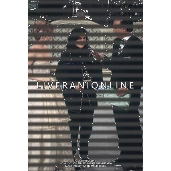 DIAP-RETROSPETTIVALAURA PAUSINI CANTANTE NELLA FOTO LAURA PAUSINI A SANREMO NELL\'ANNO 1993 CON PIPPO BAUDO E MILLY CARLUCCI AG ALDO LIVERANI SAS