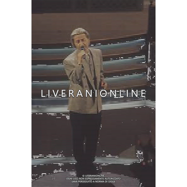 DIAP-RETROSPETTIVA AMEDEO MINGHI CANTANTE NELLA FOTO AMEDEO MINGHI A SANREMO NELL\'ANNO 1991 AG ALDO LIVERANI SAS