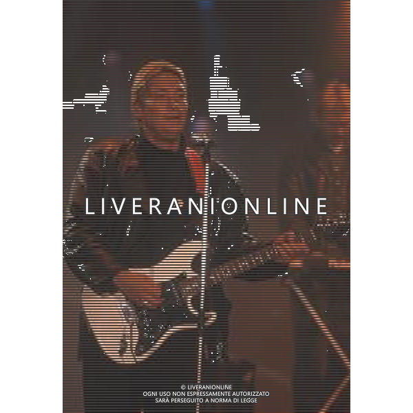 DIAP-RETROSPETTIVA CHRIS REA CANTANTE NELLA FOTO CHRIS REA A SANREMO NELL\'ANNO 1988 AG ALDO LIVERANI SAS
