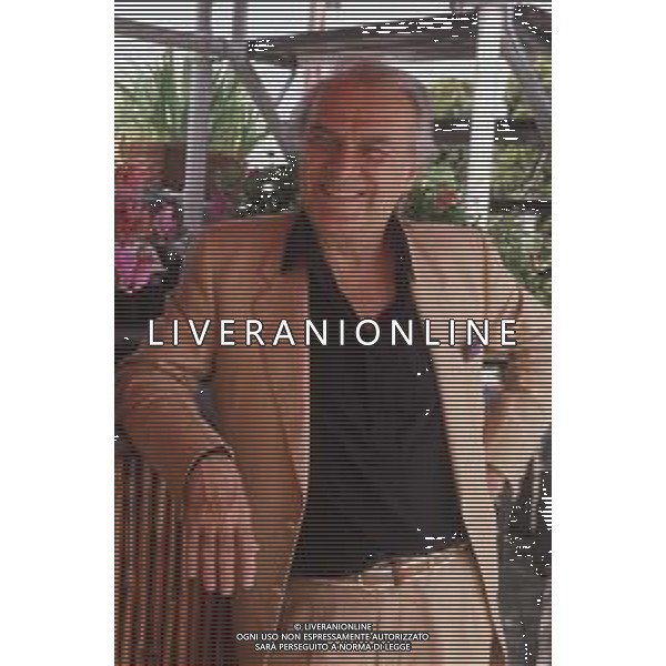 DIAP-RETROSPETTIVA GIORGIO ALBERTAZZI ATTORE NELLA FOTO GIORGIO ALBERTAZZI A MILANO IN TERRAZZA MARTINI ANNI 90 AG ALDO LIVERANI SAS 