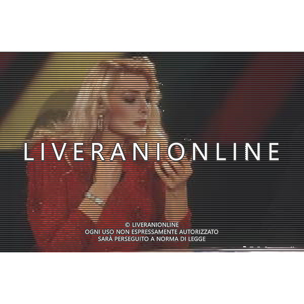 DIAP-RETROSPETTIVA ALESSANDRA CANALE ANNUNCIATRICE TELEVISIVA E CONDUTTRICE TELEVISIVA NELLA FOTO ALESSANDRA CANALE NELL\'ANNO 1994 CONDUCE LA TRASMISSIONE TELEVISIVA “IL PROCESSO DEL LUNEDI\' “ AG ALDO LIVERANI SAS
