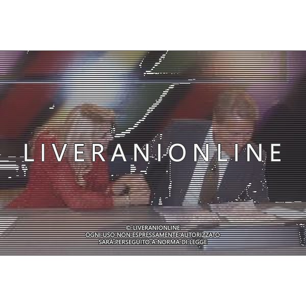 DIAP-RETROSPETTIVA ALESSANDRA CANALE ANNUNCIATRICE TELEVISIVA E CONDUTTRICE TELEVISIVA NELLA FOTO ALESSANDRA CANALE CON ALDO BISCARDI NELL\'ANNO 1994 CONDUCE LA TRASMISSIONE TELEVISIVA “IL PROCESSO DEL LUNEDI\' “ AG ALDO LIVERANI SAS