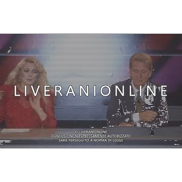 DIAP-RETROSPETTIVA ALESSANDRA CANALE ANNUNCIATRICE TELEVISIVA E CONDUTTRICE TELEVISIVA NELLA FOTO ALESSANDRA CANALE CON ALDO BISCARDI NELL\'ANNO 1994 CONDUCE LA TRASMISSIONE TELEVISIVA “IL PROCESSO DEL LUNEDI\' “ AG ALDO LIVERANI SAS