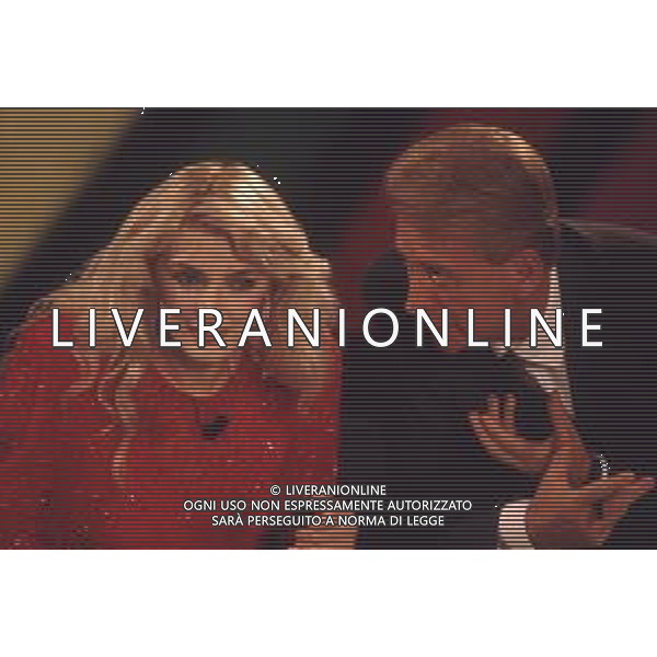 DIAP-RETROSPETTIVA ALESSANDRA CANALE ANNUNCIATRICE TELEVISIVA E CONDUTTRICE TELEVISIVA NELLA FOTO ALESSANDRA CANALE CON ALDO BISCARDI NELL\'ANNO 1994 CONDUCE LA TRASMISSIONE TELEVISIVA “IL PROCESSO DEL LUNEDI\' “ AG ALDO LIVERANI SAS