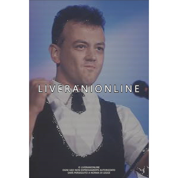 DIAP-RETROSPETTIVA ENRICO RUGGERI CANTANTE NELLA FOTO ENRICO RUGGERI A SAINT VINCENT NELL\'ANNO 1989 AG ALDO LIVERANI SAS