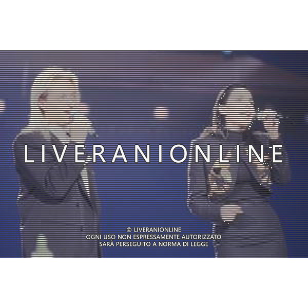 DIAP-RETROSPETTIVA AMEDEO MINGHI CANTANTE NELLA FOTO AMEDEO MINGHI CON MIETTA AL FESTIVAL DI SANREMO NELL\'ANNO 1990 AG ALDO LIVERANI SAS