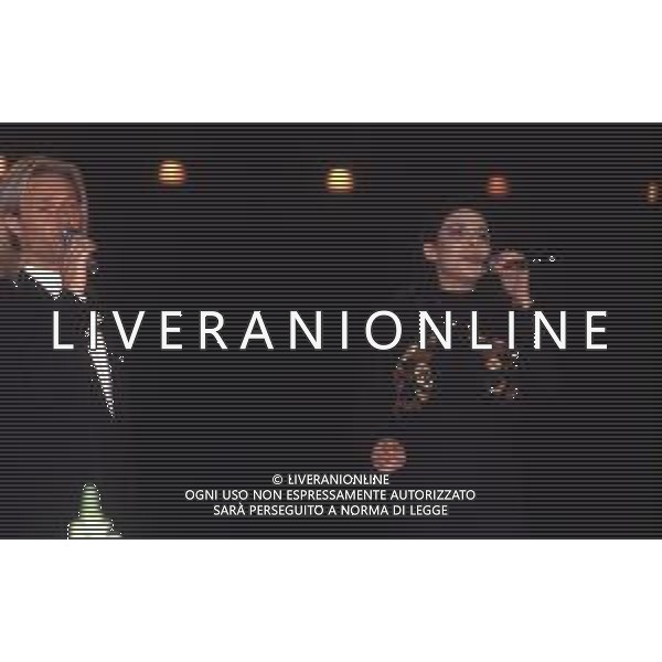 DIAP-RETROSPETTIVA AMEDEO MINGHI CANTANTE NELLA FOTO AMEDEO MINGHI CON MIETTA AL FESTIVAL DI SANREMO NELL\'ANNO 1990 AG ALDO LIVERANI SAS