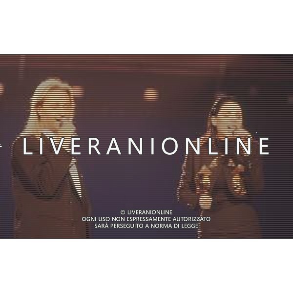 DIAP-RETROSPETTIVA AMEDEO MINGHI CANTANTE NELLA FOTO AMEDEO MINGHI CON MIETTA AL FESTIVAL DI SANREMO NELL\'ANNO 1990 AG ALDO LIVERANI SAS