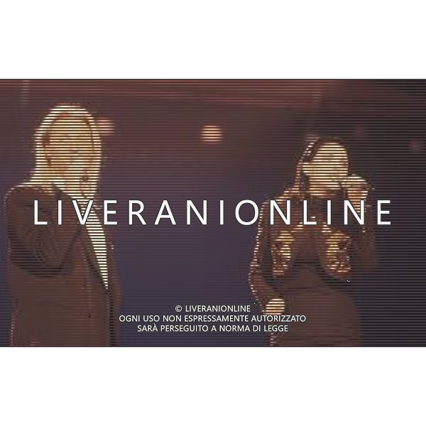 DIAP-RETROSPETTIVA AMEDEO MINGHI CANTANTE NELLA FOTO AMEDEO MINGHI CON MIETTA AL FESTIVAL DI SANREMO NELL\'ANNO 1990 AG ALDO LIVERANI SAS