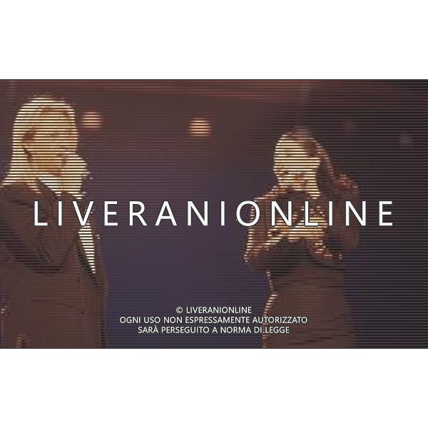 DIAP-RETROSPETTIVA AMEDEO MINGHI CANTANTE NELLA FOTO AMEDEO MINGHI CON MIETTA AL FESTIVAL DI SANREMO NELL\'ANNO 1990 AG ALDO LIVERANI SAS