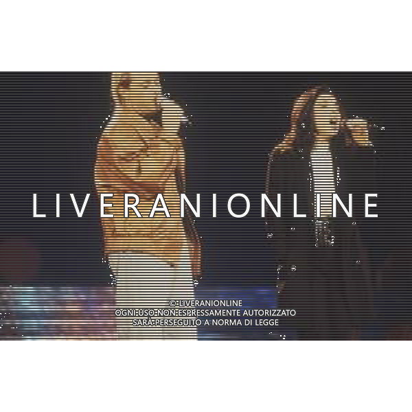 DIAP-RETROSPETTIVA AMEDEO MINGHI CANTANTE NELLA FOTO AMEDEO MINGHI CON MIETTA AL FESTIVAL DI SANREMO NELL\'ANNO 1990 AG ALDO LIVERANI SAS