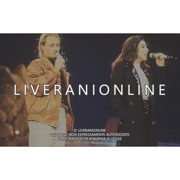 DIAP-RETROSPETTIVA AMEDEO MINGHI CANTANTE NELLA FOTO AMEDEO MINGHI CON MIETTA AL FESTIVAL DI SANREMO NELL\'ANNO 1990 AG ALDO LIVERANI SAS