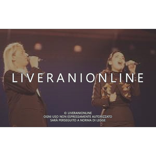 DIAP-RETROSPETTIVA AMEDEO MINGHI CANTANTE NELLA FOTO AMEDEO MINGHI CON MIETTA AL FESTIVAL DI SANREMO NELL\'ANNO 1990 AG ALDO LIVERANI SAS