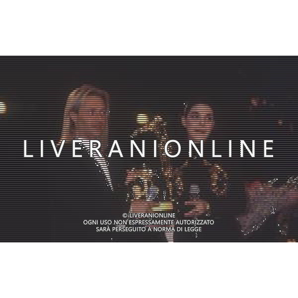 DIAP-RETROSPETTIVA AMEDEO MINGHI CANTANTE NELLA FOTO AMEDEO MINGHI CON MIETTA AL FESTIVAL DI SANREMO NELL\'ANNO 1990 AG ALDO LIVERANI SAS