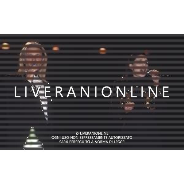 DIAP-RETROSPETTIVA AMEDEO MINGHI CANTANTE NELLA FOTO AMEDEO MINGHI CON MIETTA AL FESTIVAL DI SANREMO NELL\'ANNO 1990 AG ALDO LIVERANI SAS