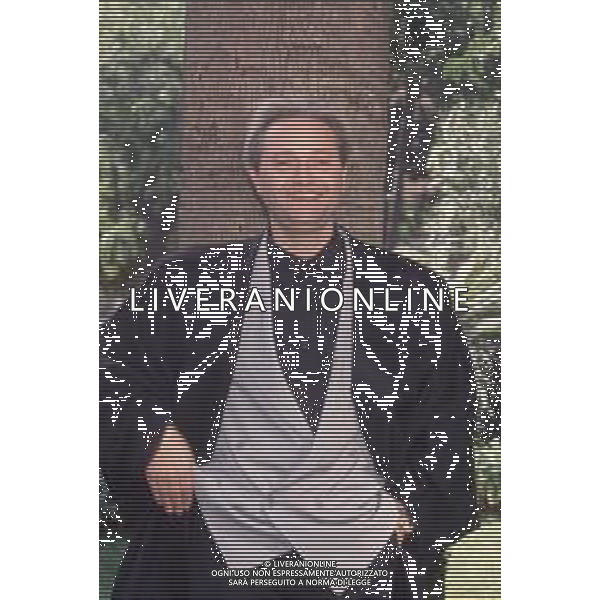 DIAP-RETROSPETTIVA AMEDEO MINGHI CANTANTE NELLA FOTO AMEDEO MINGHI AL FESTIVAL DI SANREMO NELL\'ANNO 1990 AG ALDO LIVERANI SAS