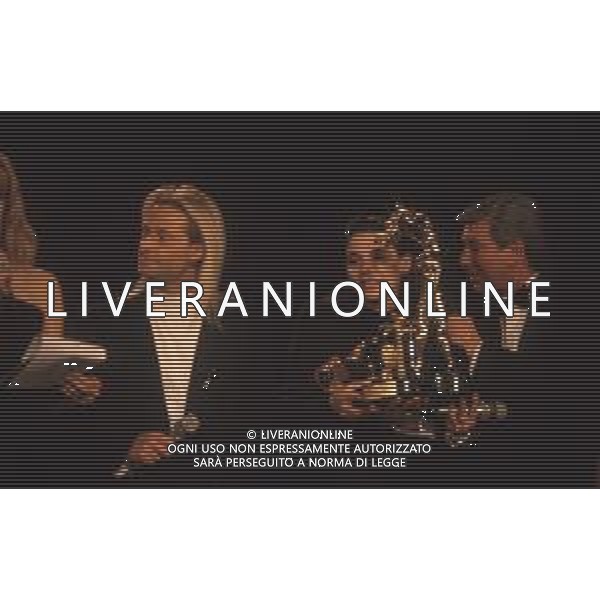 DIAP-RETROSPETTIVA AMEDEO MINGHI CANTANTE NELLA FOTO AMEDEO MINGHI CON MIETTA AL FESTIVAL DI SANREMO NELL\'ANNO 1990 AG ALDO LIVERANI SAS