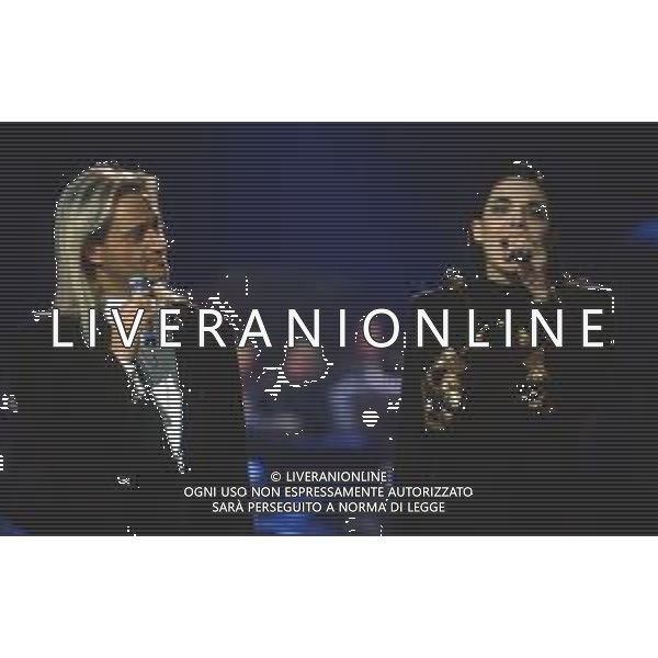 DIAP-RETROSPETTIVA AMEDEO MINGHI CANTANTE NELLA FOTO AMEDEO MINGHI CON MIETTA AL FESTIVAL DI SANREMO NELL\'ANNO 1990 AG ALDO LIVERANI SAS