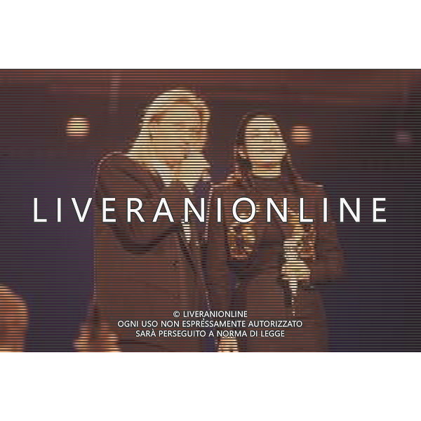 DIAP-RETROSPETTIVA AMEDEO MINGHI CANTANTE NELLA FOTO AMEDEO MINGHI CON MIETTA AL FESTIVAL DI SANREMO NELL\'ANNO 1990 AG ALDO LIVERANI SAS