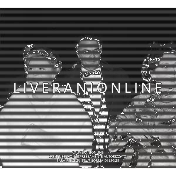NEG-Federico Fellini regista, sceneggiatore, scrittore e fumettista italiano - Retrospettiva nella foto con la moglie Giulietta Masina e Angelo Rizzoli alla Prima di \' Giulietta degli Spiriti \' a Milano Ottobre 1965 © Archivio / AGENZIA ALDO LIVERANI SAS
