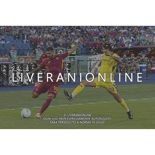 Zeki Çelik of AS Roma competes for the ball with Domagoj Bradaric of Hellas Verona FC during AS Roma vs Hellas Verona FC, 5° Serie A Enilive 2025-26 game at Olimpic stadium in Roma (RM), Italy, on September 28, 2025. (Photo by Davide Casentini) AG ALDO LIVERANI SAS
