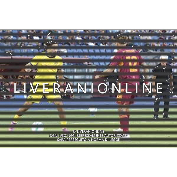 Suat Serdar of Hellas Verona FC competes for the ball with Kostas Tsimikas of AS Roma during AS Roma vs Hellas Verona FC, 5° Serie A Enilive 2025-26 game at Olimpic stadium in Roma (RM), Italy, on September 28, 2025. (Photo by Davide Casentini) AG ALDO LIVERANI SAS