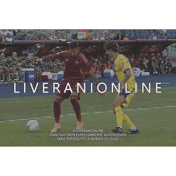 Zeki Çelik of AS Roma competes for the ball with Domagoj Bradaric of Hellas Verona FC during AS Roma vs Hellas Verona FC, 5° Serie A Enilive 2025-26 game at Olimpic stadium in Roma (RM), Italy, on September 28, 2025. (Photo by Davide Casentini) AG ALDO LIVERANI SAS