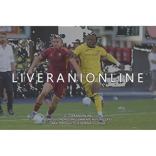 Evan Ferguson of AS Roma battle for the ball with Armel Bella-Kotchap of Hellas Verona FC during AS Roma vs Hellas Verona FC, 5° Serie A Enilive 2025-26 game at Olimpic stadium in Roma (RM), Italy, on September 28, 2025. (Photo by Davide Casentini) AG ALDO LIVERANI SAS