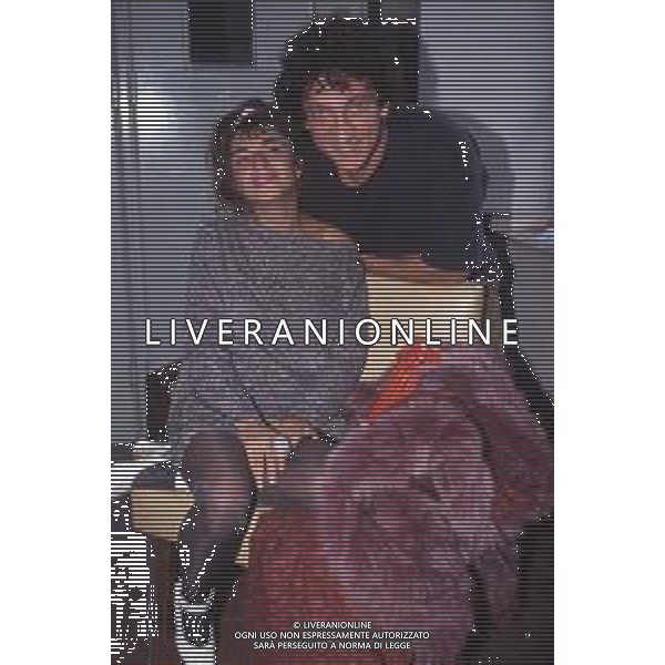 DIAP-RETROSPETTIVA EUGENIO BENNATO CANTANTE NELLA FOTO EUGENIO BENNATO A SANREMO NELL\'ANNO 1992 CON PIETRA MONTECORVINO AG ALDO LIVERANI SAS